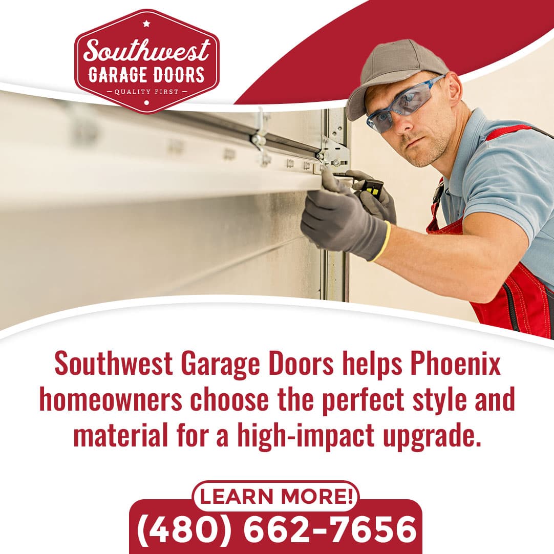 Technician installing and adjusting a residential garage door track and hardware